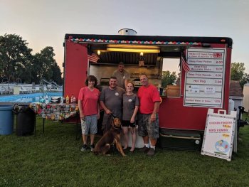 A food truck by the pool at The Ridge Campground