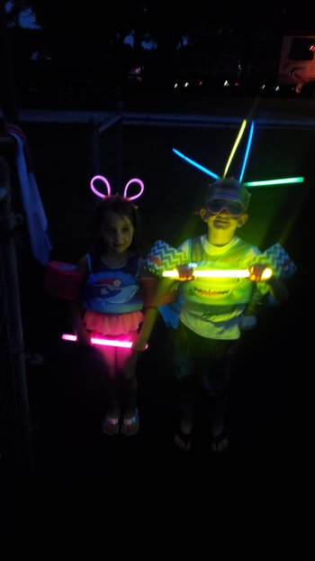 kids wearing glow sticks