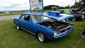 Blue fastback with the hood lifted at The Ridge Campground