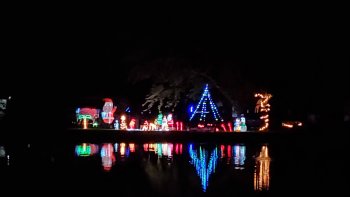 Christmas lights reflecting on the water