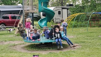 Kids on merry go round