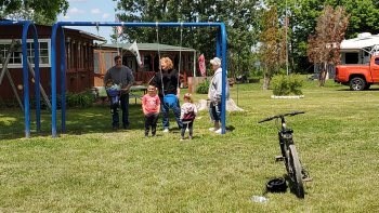 people on swings