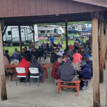 People playing bingo under pavilion