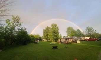 Rainbow over campsites