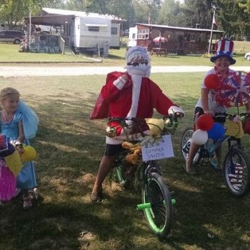 Kids on a bike for a parade